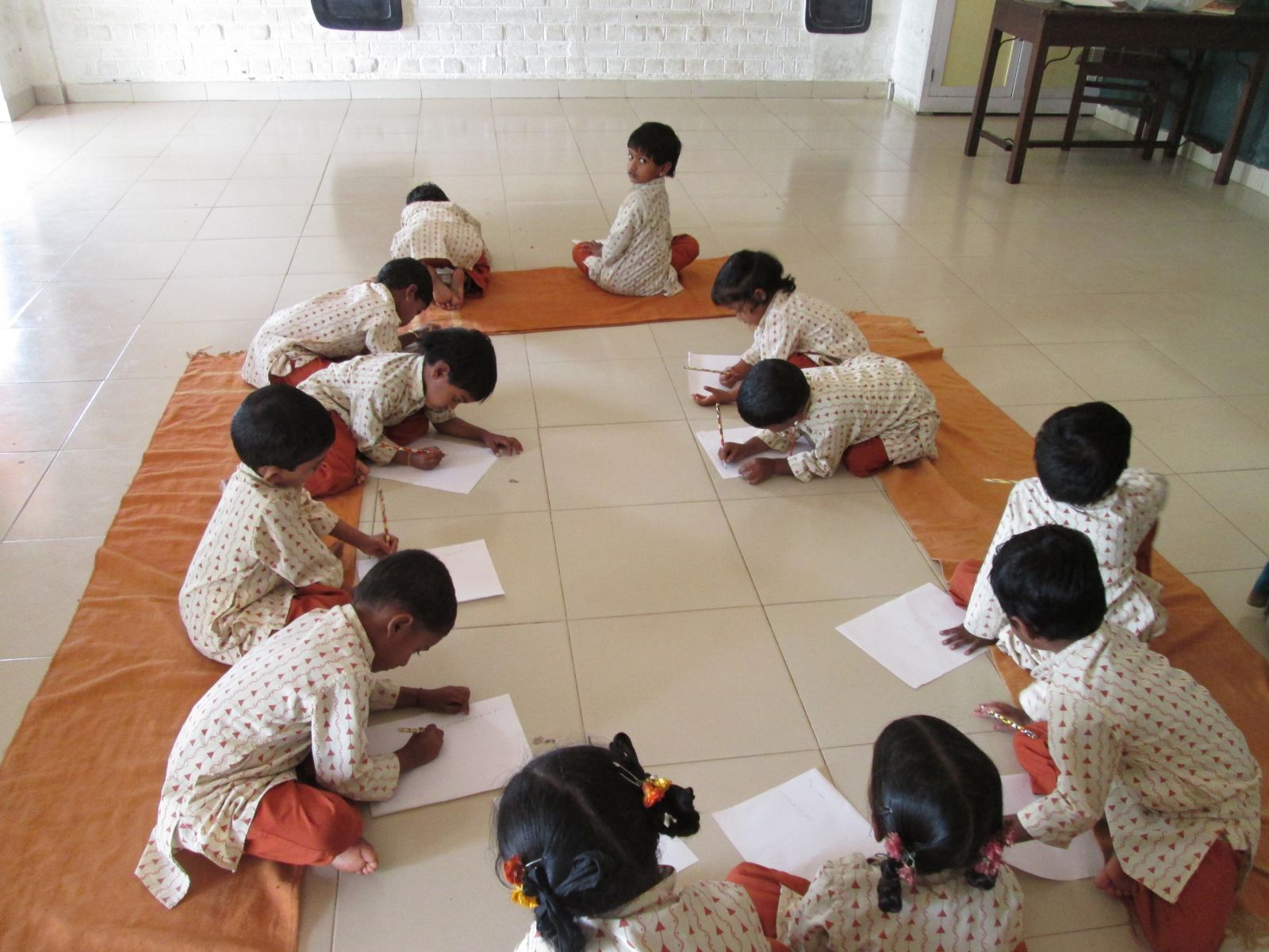 Children using the pencils